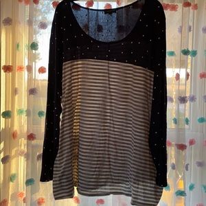 Women’s plus size, long sleeve shirt.